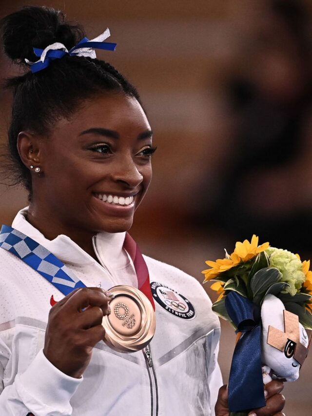 Simone Biles is a record breaking Olympian with gymnastic skills named after her, but feared she would be ‘banned from America’ after Tokyo 2020